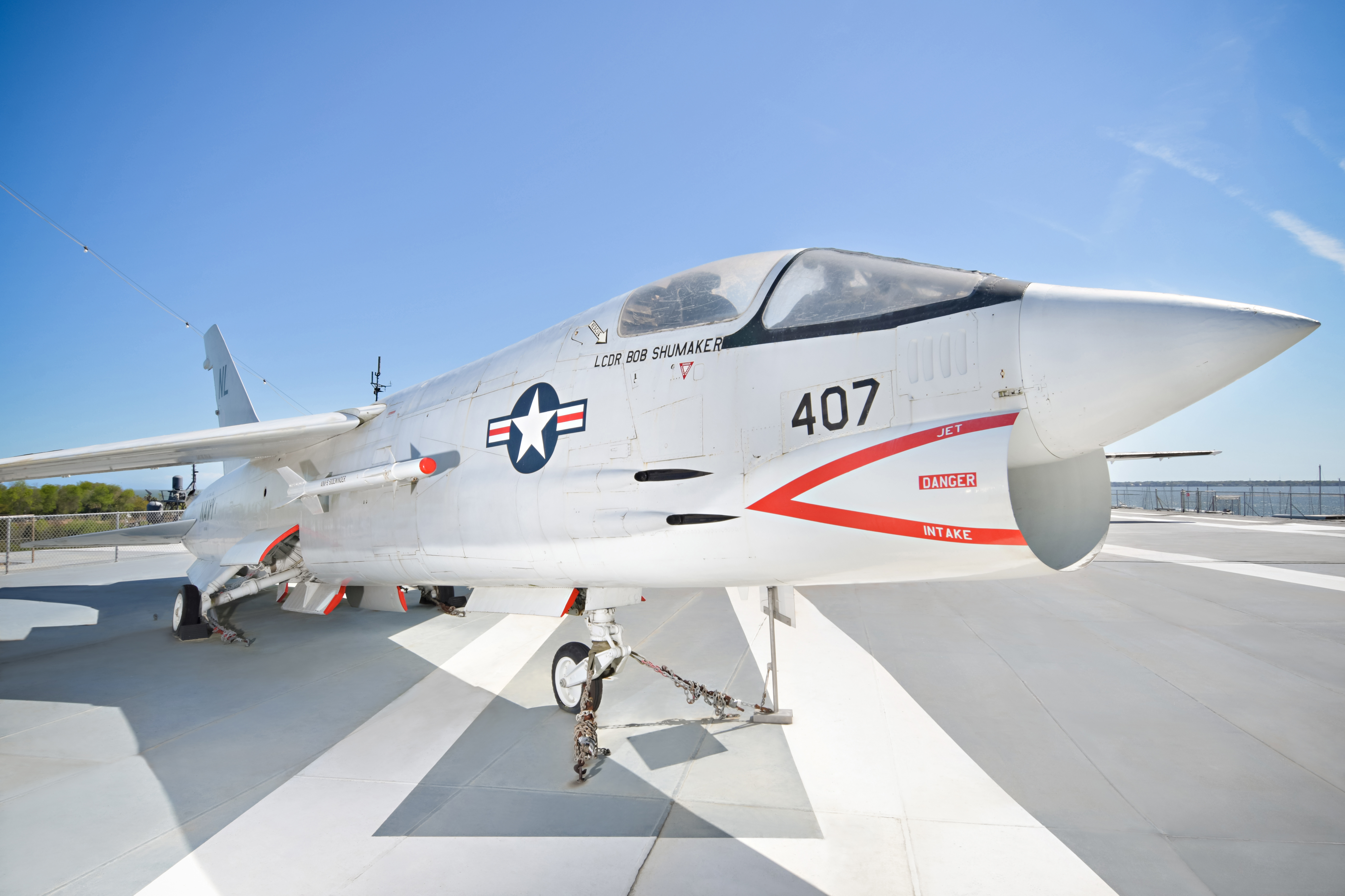 image of an aircraft sitting on the flight deck of a ship