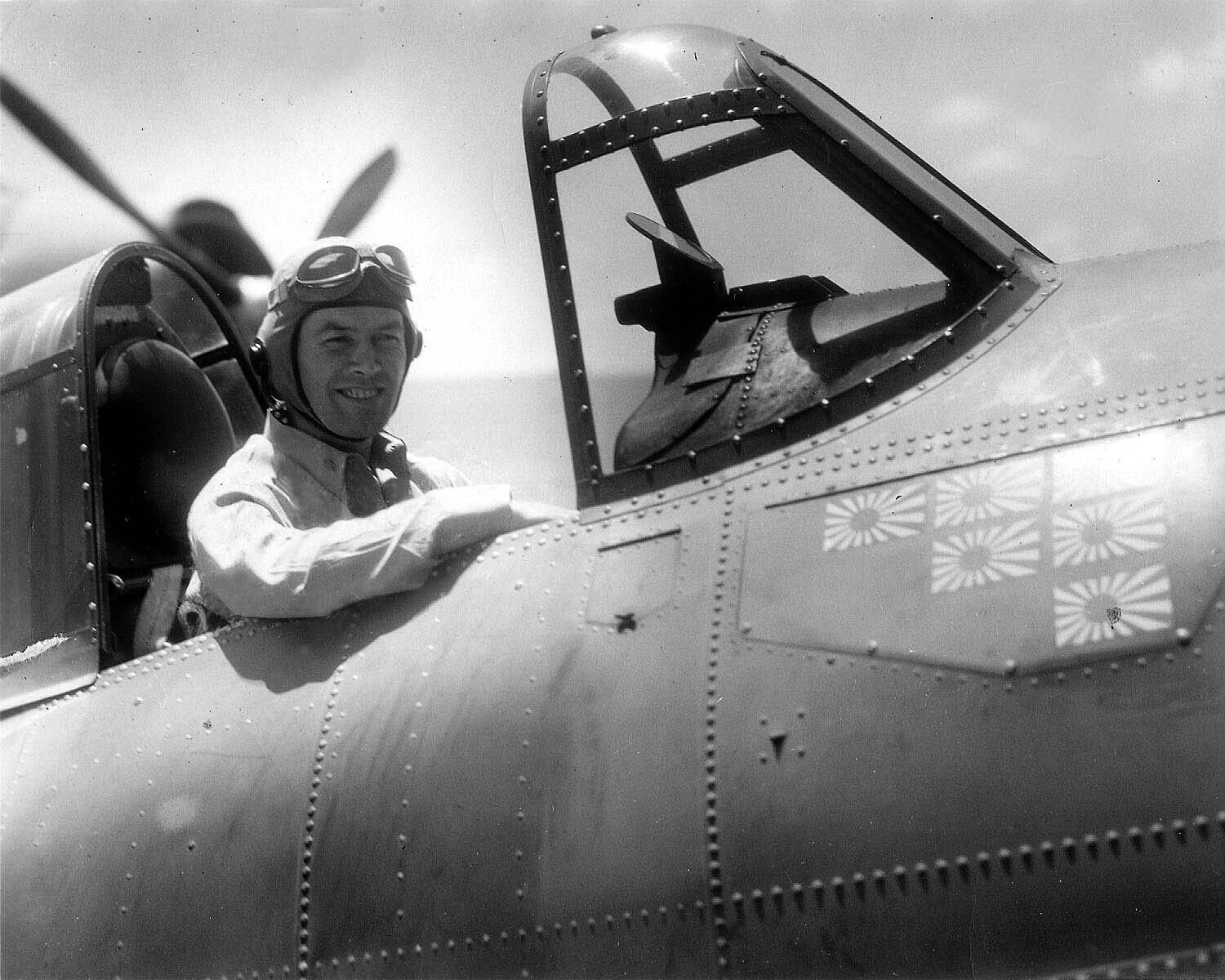 Primary Image of James H. Flatley Jr. in the Cockpit of his F4F-4 Wildcat