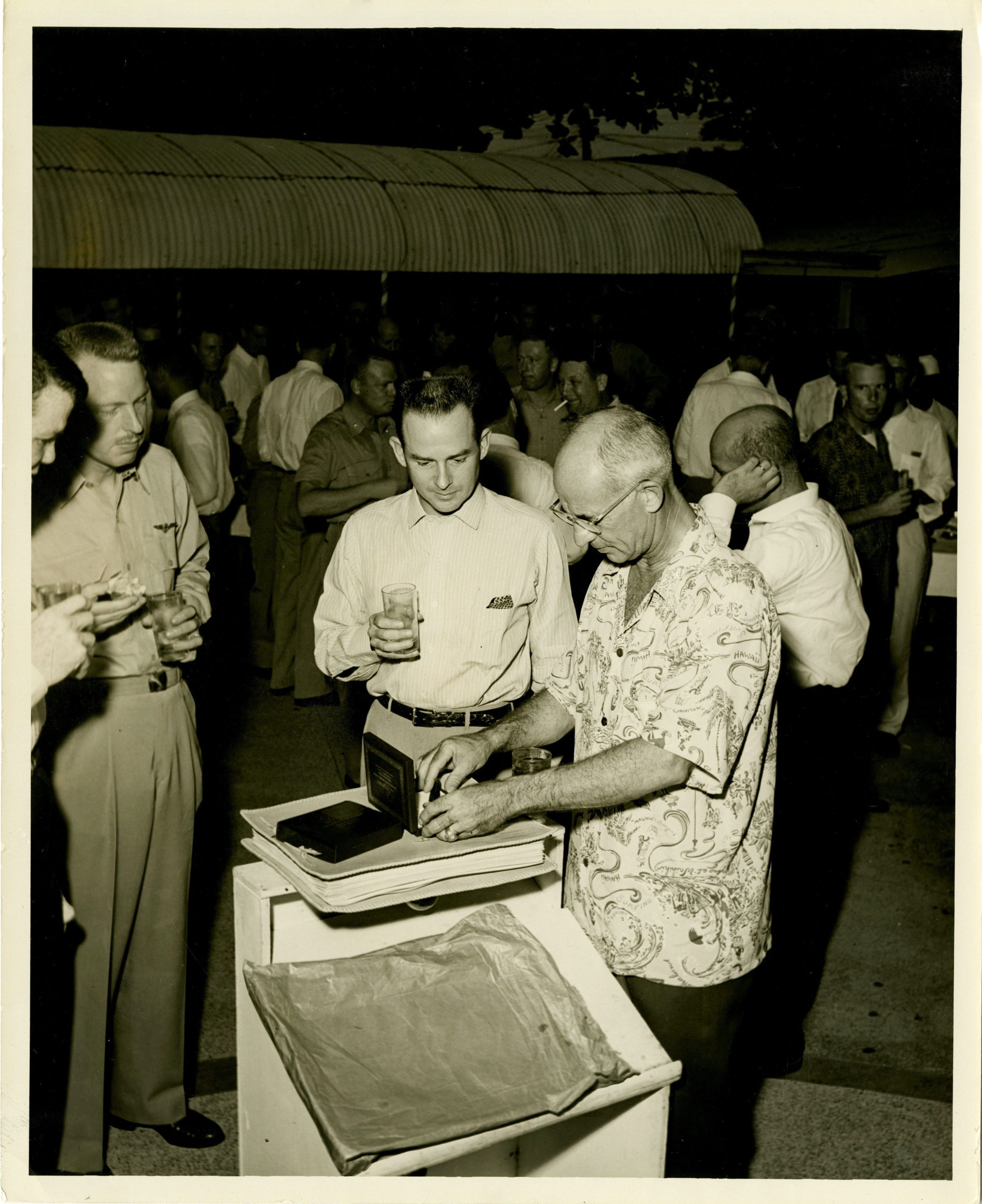 Primary Image of Captain McKechnie Viewing His Farewell Gifts