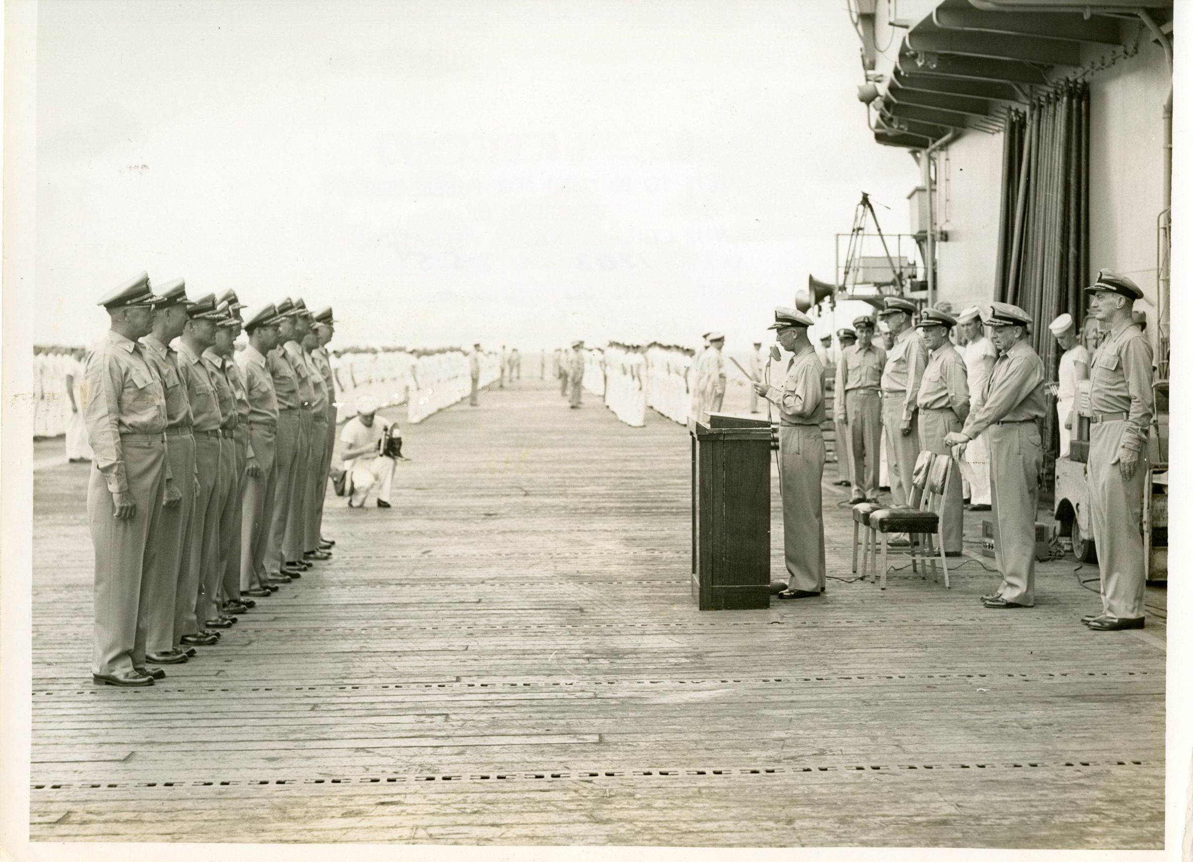 Primary Image of Captain Arnold McKechnie Reading his Final Orders at the Changing of Command Ceremony