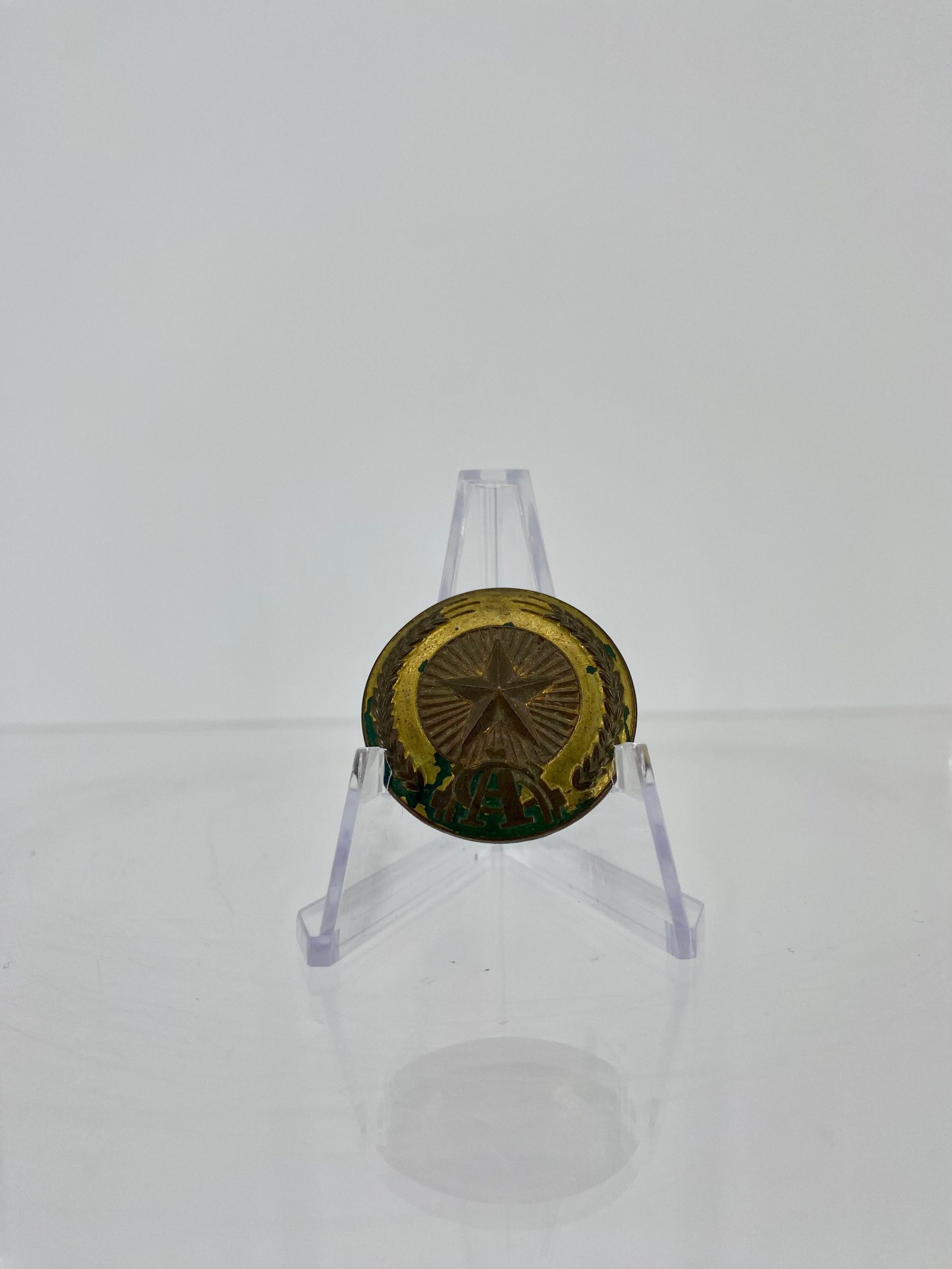 Primary Image of Viet Cong Helmet Badge