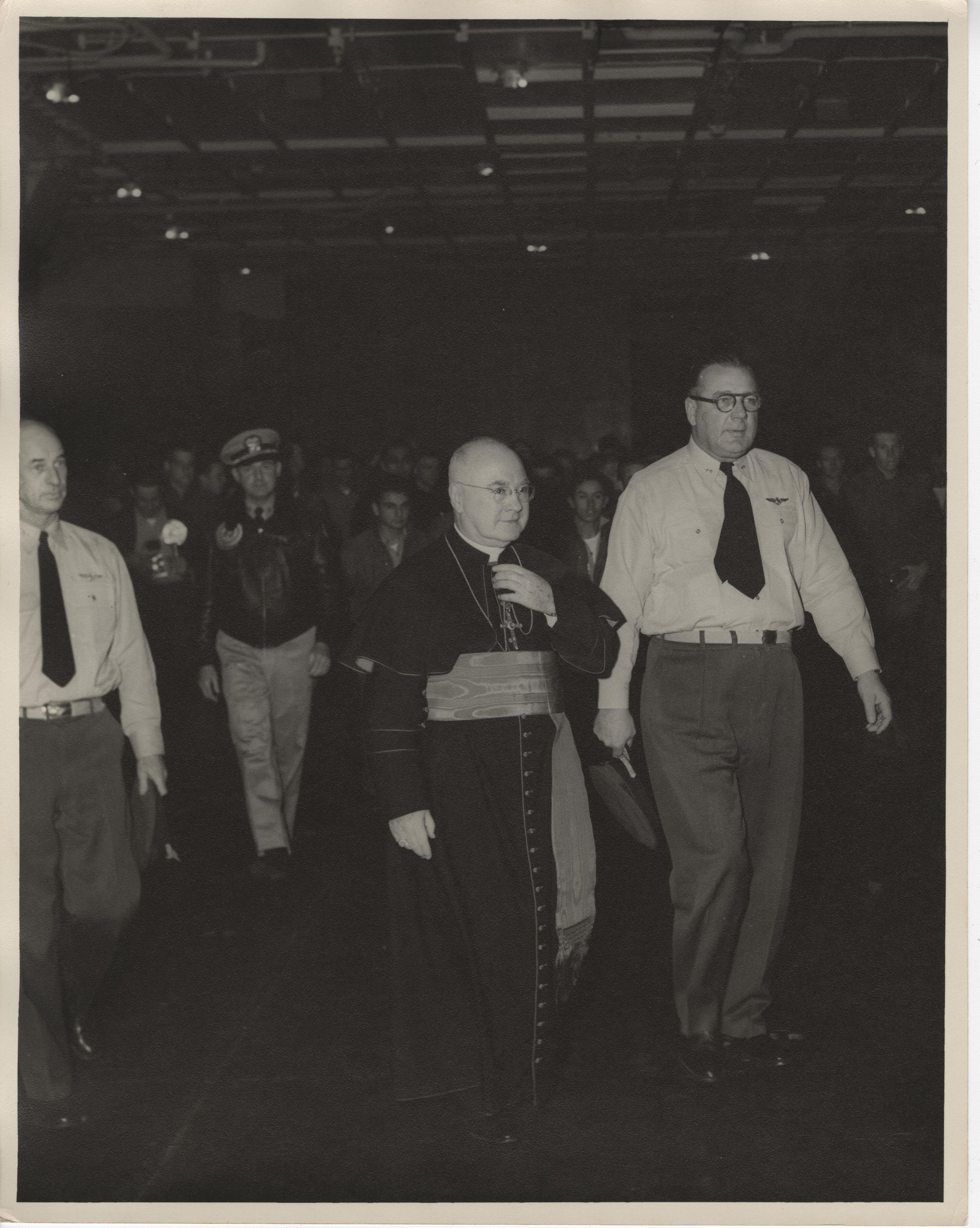 Primary Image of Captain McKechnie on the Hangar Deck with Cardinal Francis Spellman