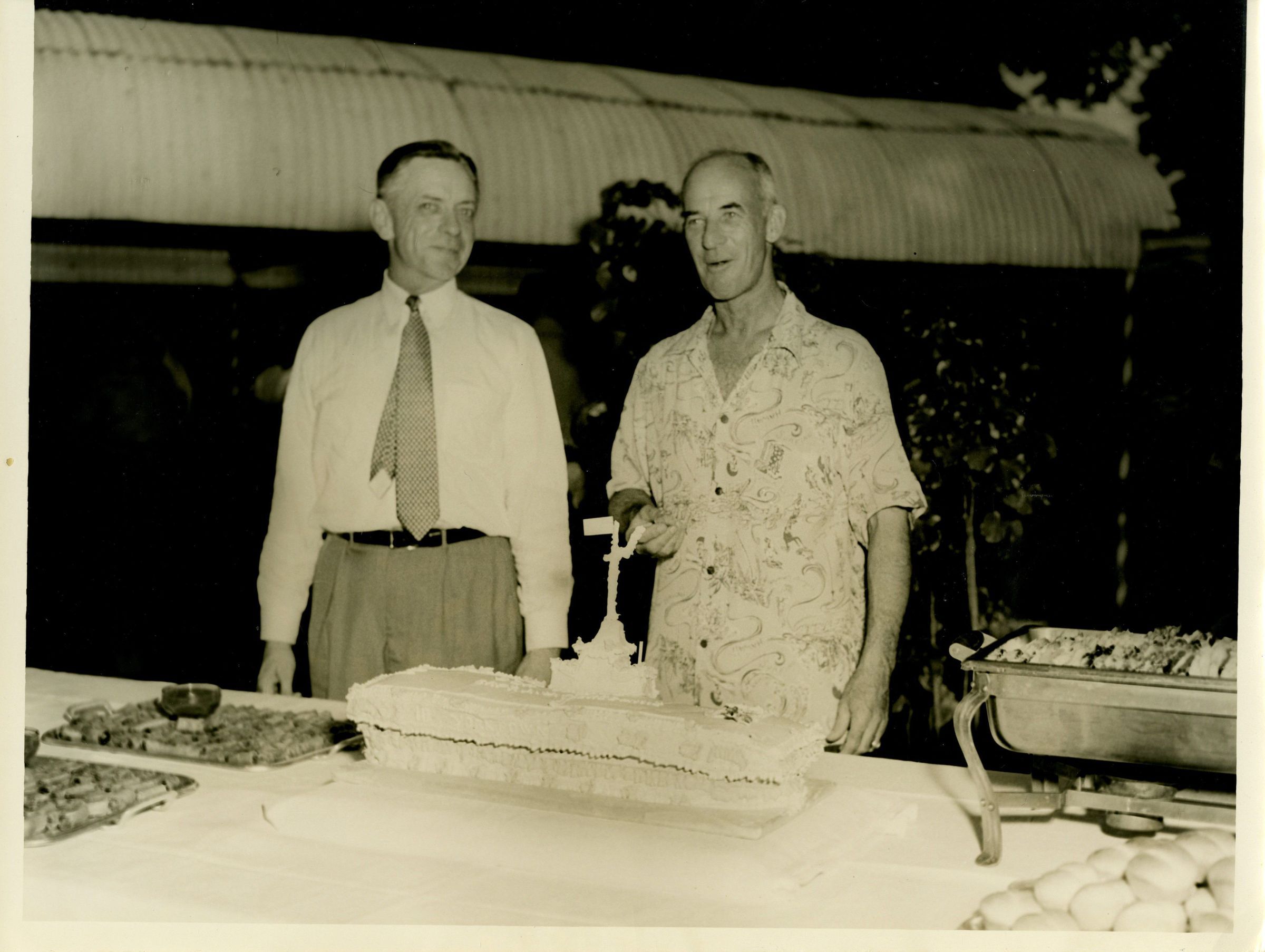 Primary Image of Captain Arnold McKechnie Tries His Farewell Party Cake