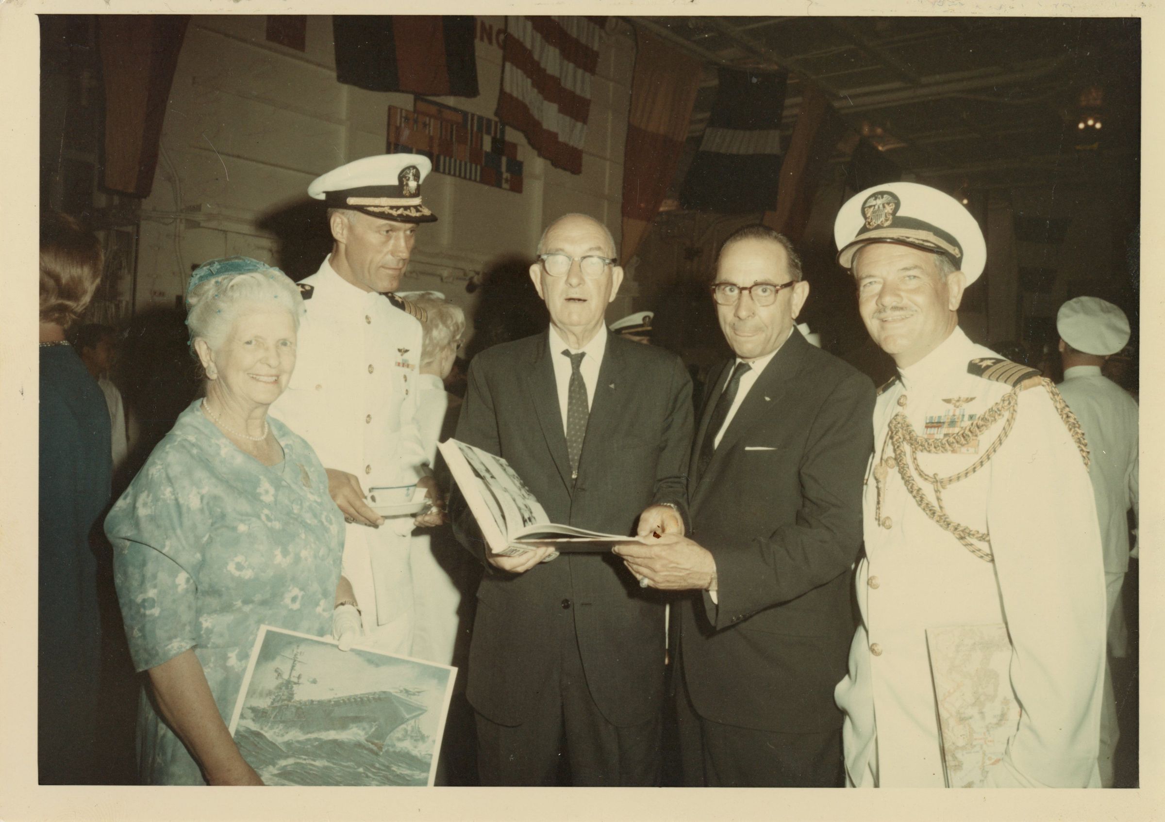 Primary Image of Arthur Beaumont Presents one of his Paintings to Captain Cain and The USS Yorktown