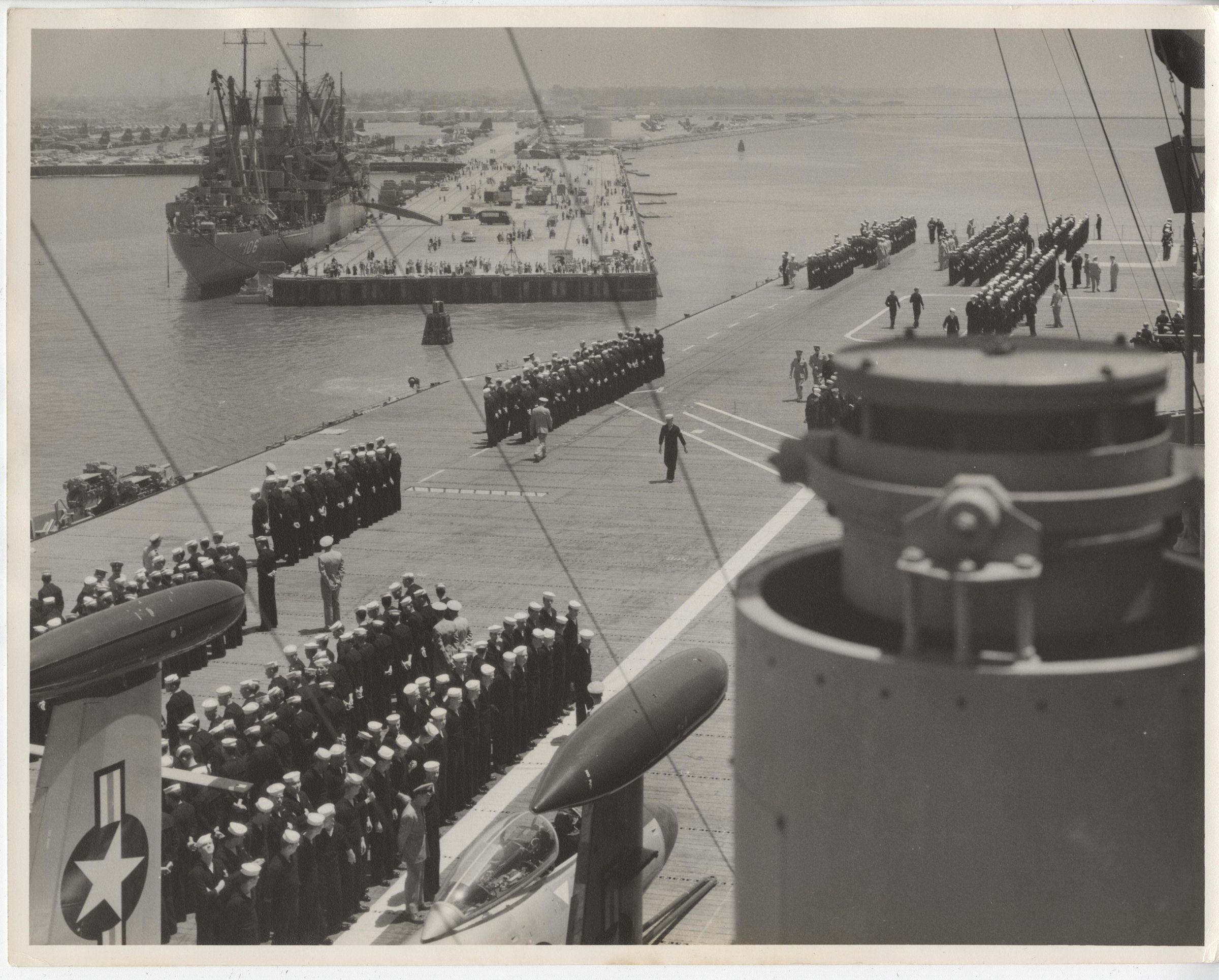 Primary Image of USS Yorktown's Crew at Flight Deck Parade as They Leave Port