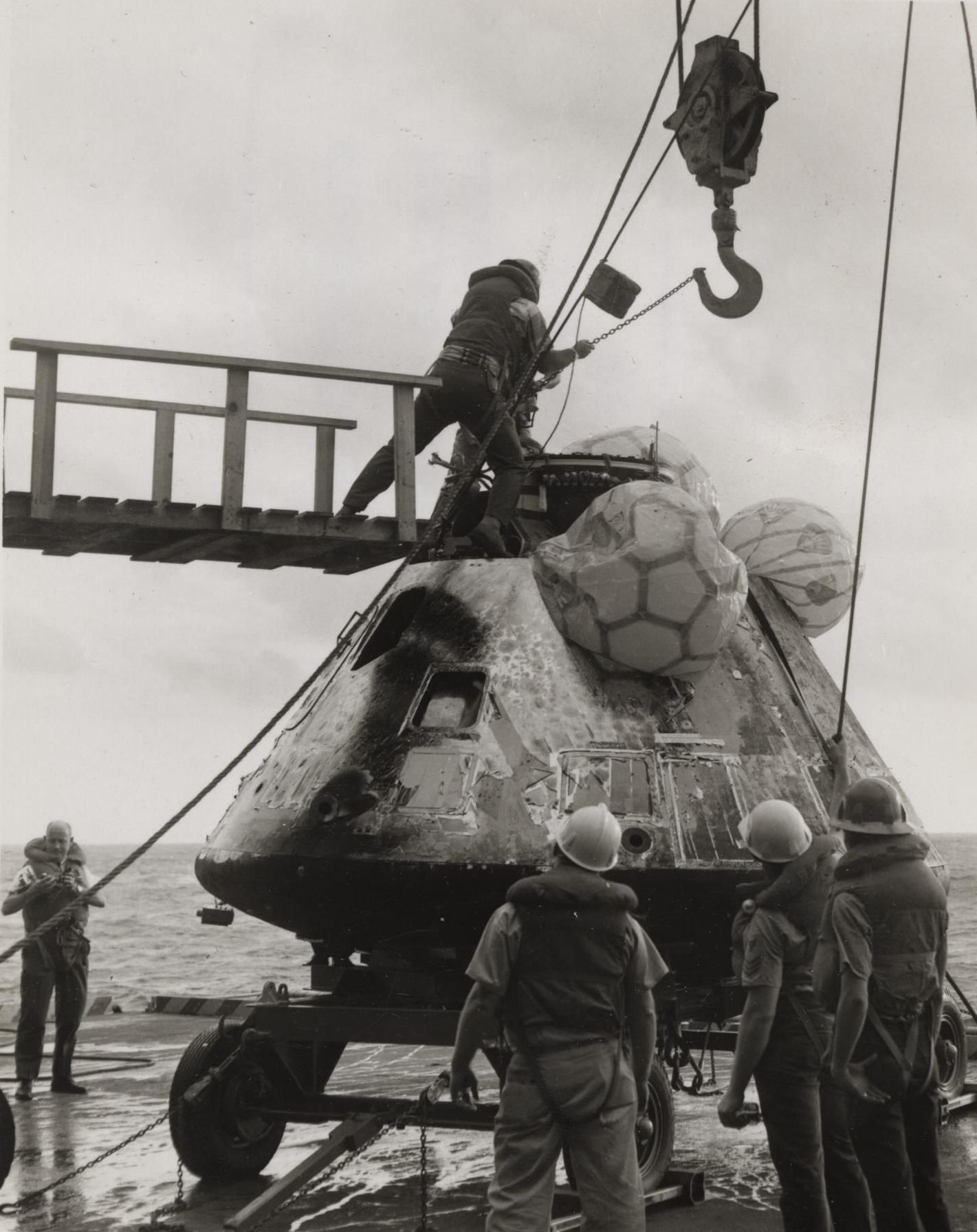 Primary Image of Yorktown Crewmen Work to Unhook The Apollo 8 Capsule