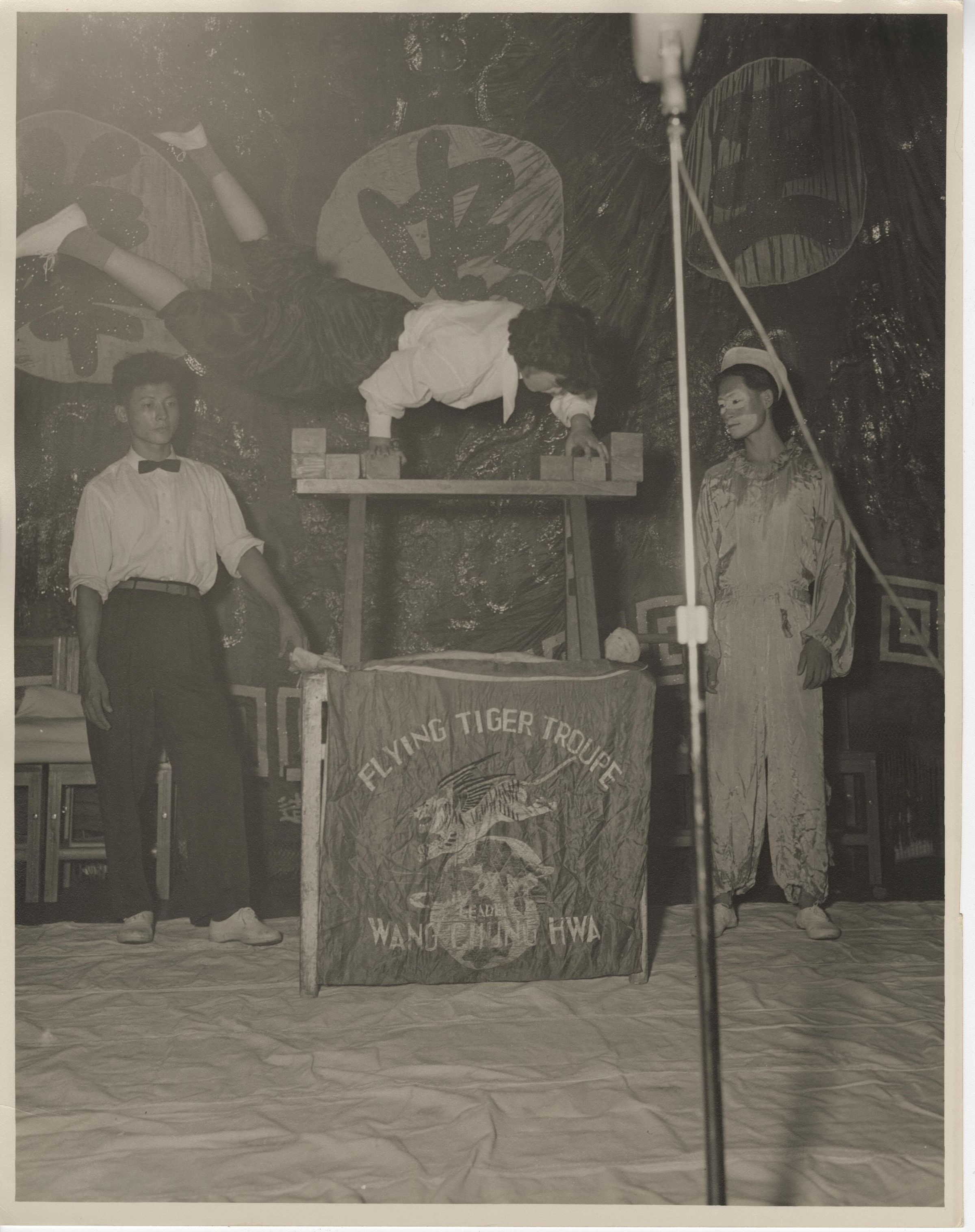 Primary Image of Flying Tiger Troupe Performs Acrobatics Aboard the USS Yorktown (CVA-10)