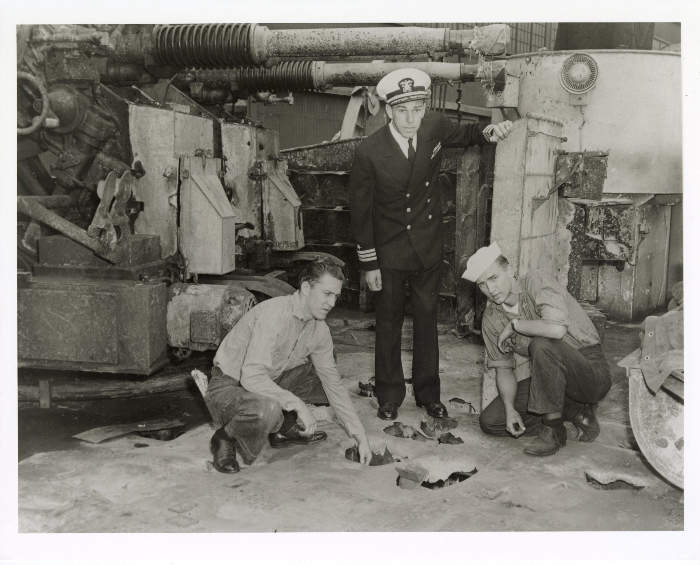 Primary Image of Captain Becton and his Men Inspect the Damage