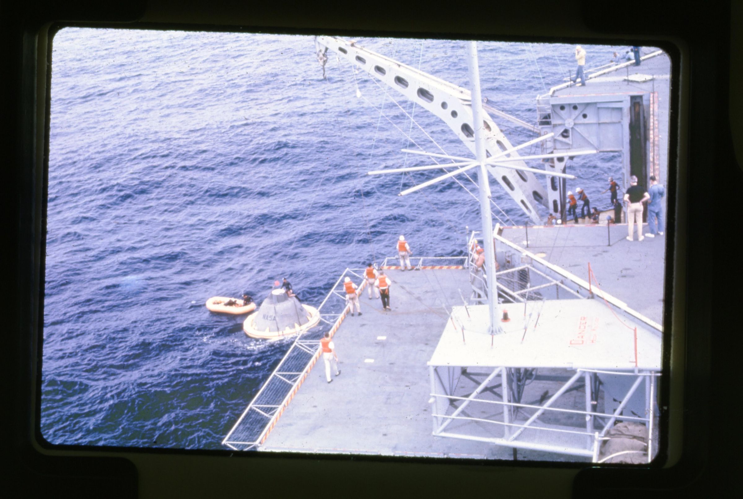 Primary Image of The Apollo 8 Capsule Being Brought Aboard The USS Yorktown (CVS-10)