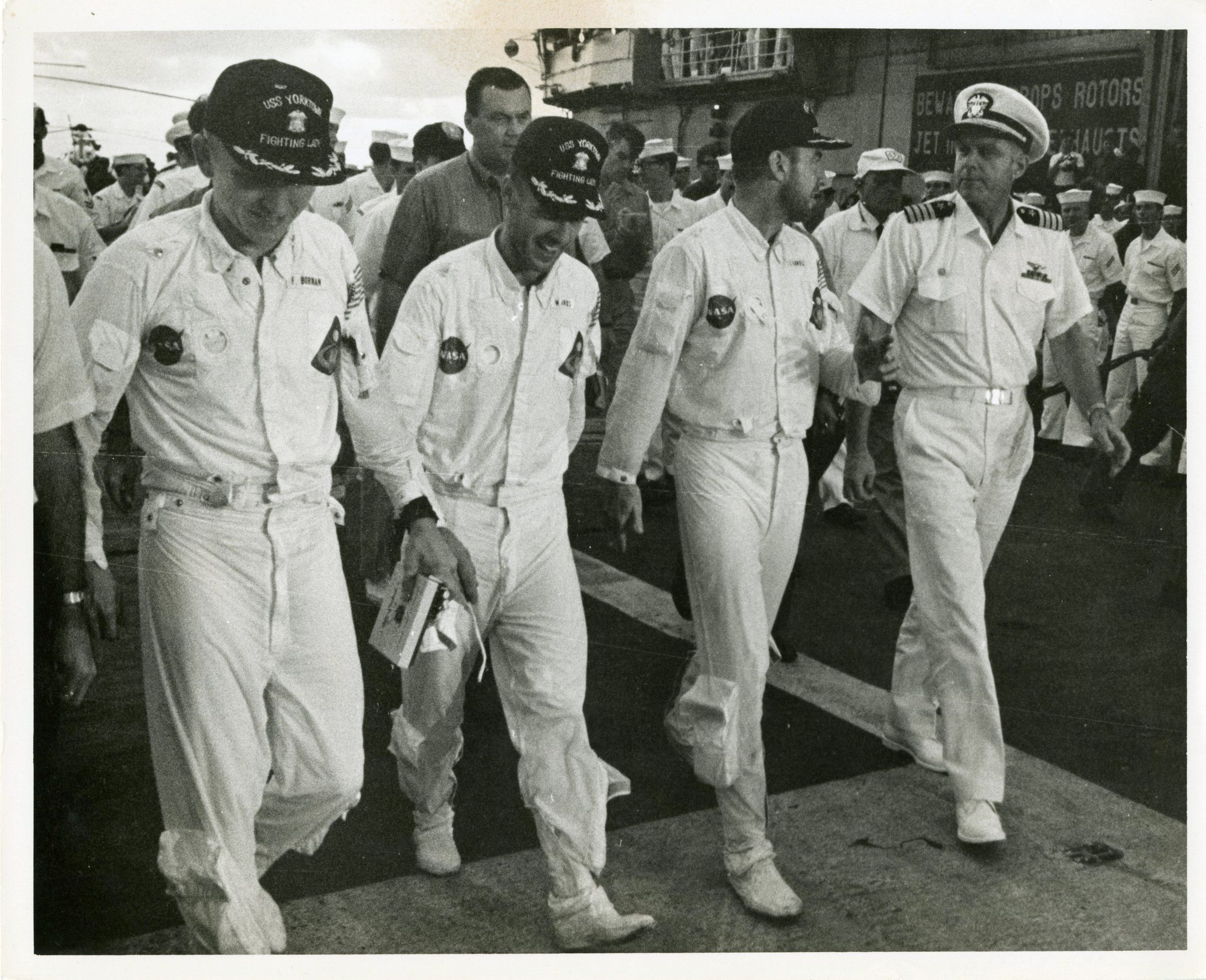 Primary Image of The Apollo 8 Astronauts Walk the Flightdeck