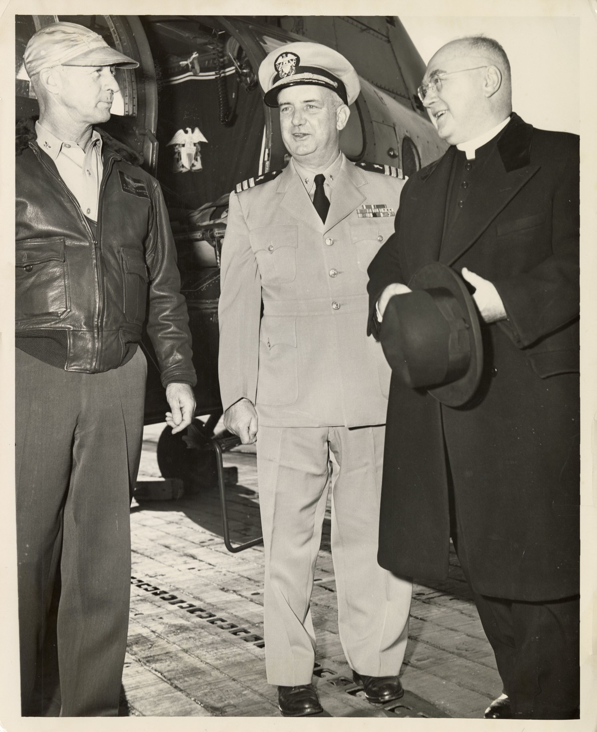 Primary Image of Captain Arnold McKechnie Welcomes Commander Connolly and Cardinal Francis Spellman to the USS Yorktown (CVA-10)