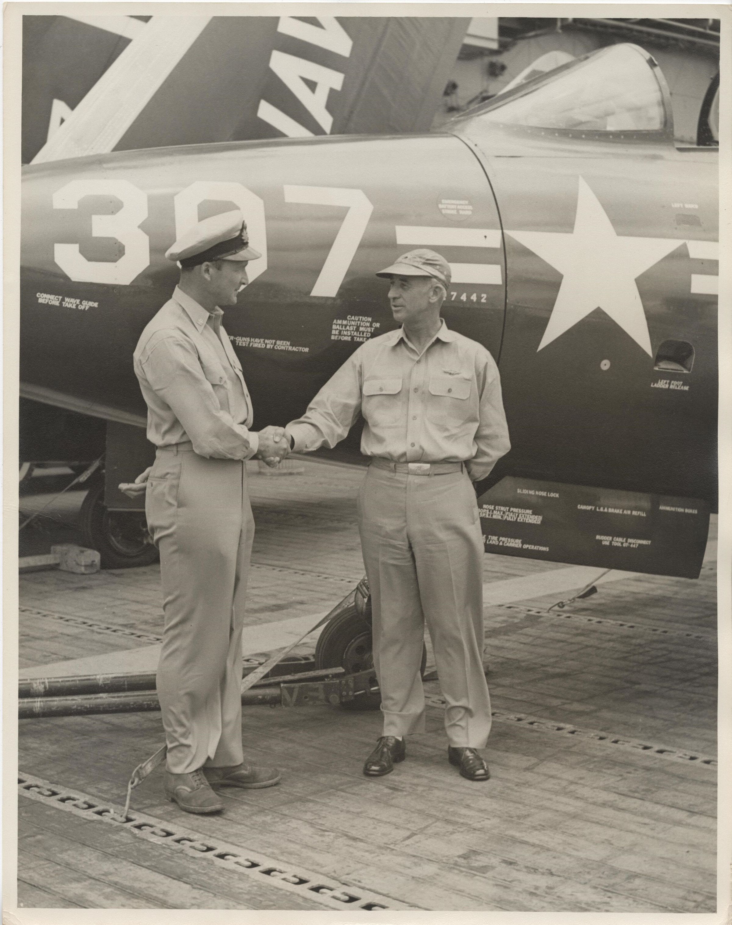 Primary Image of Captain Arnold McKechnie Congratulates H. J. Hunter