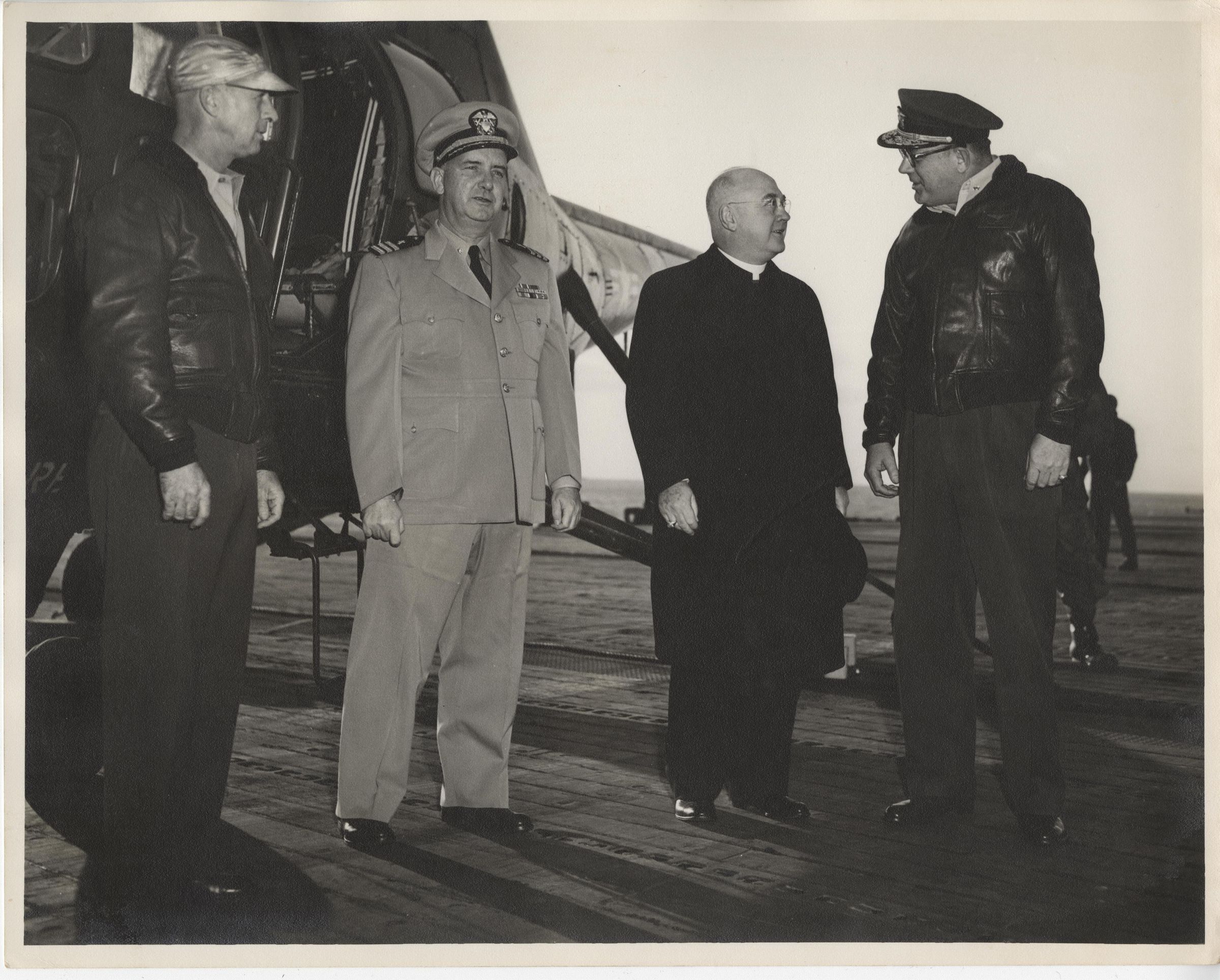 Primary Image of Captain McKechnie and Cardinal Francis Spellman Standing on the Flight Deck