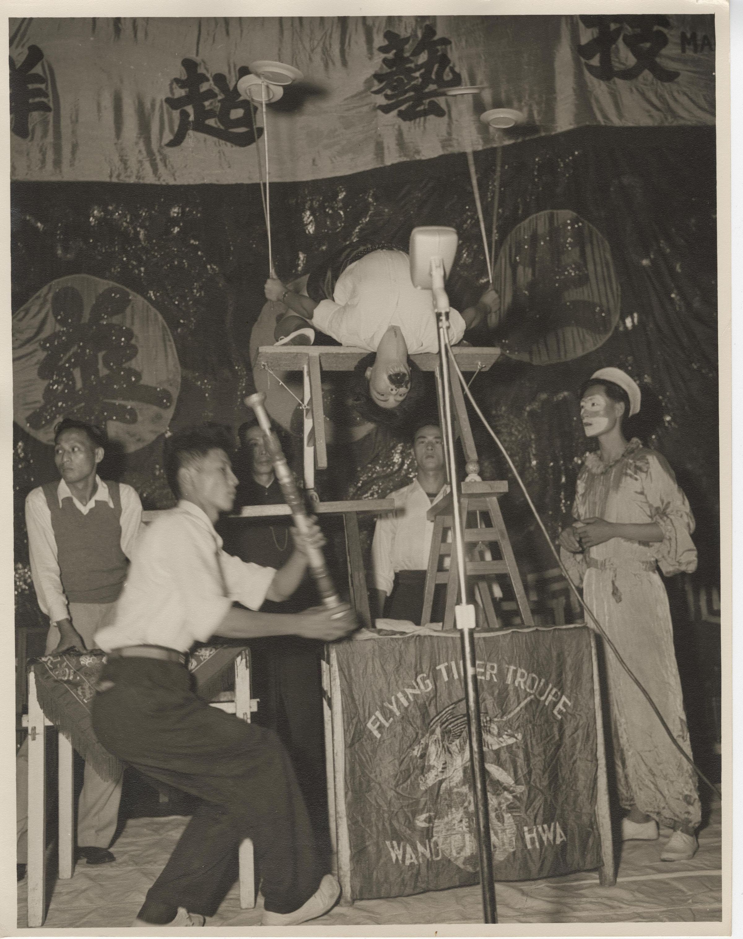 Primary Image of The Flying Tiger Troupe Spinning Plates