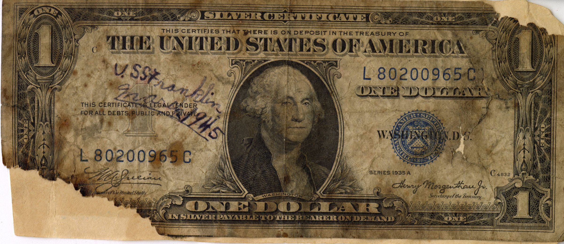 Primary Image of Burnt Dollar Found after the USS Franklin (CV-13) Disaster