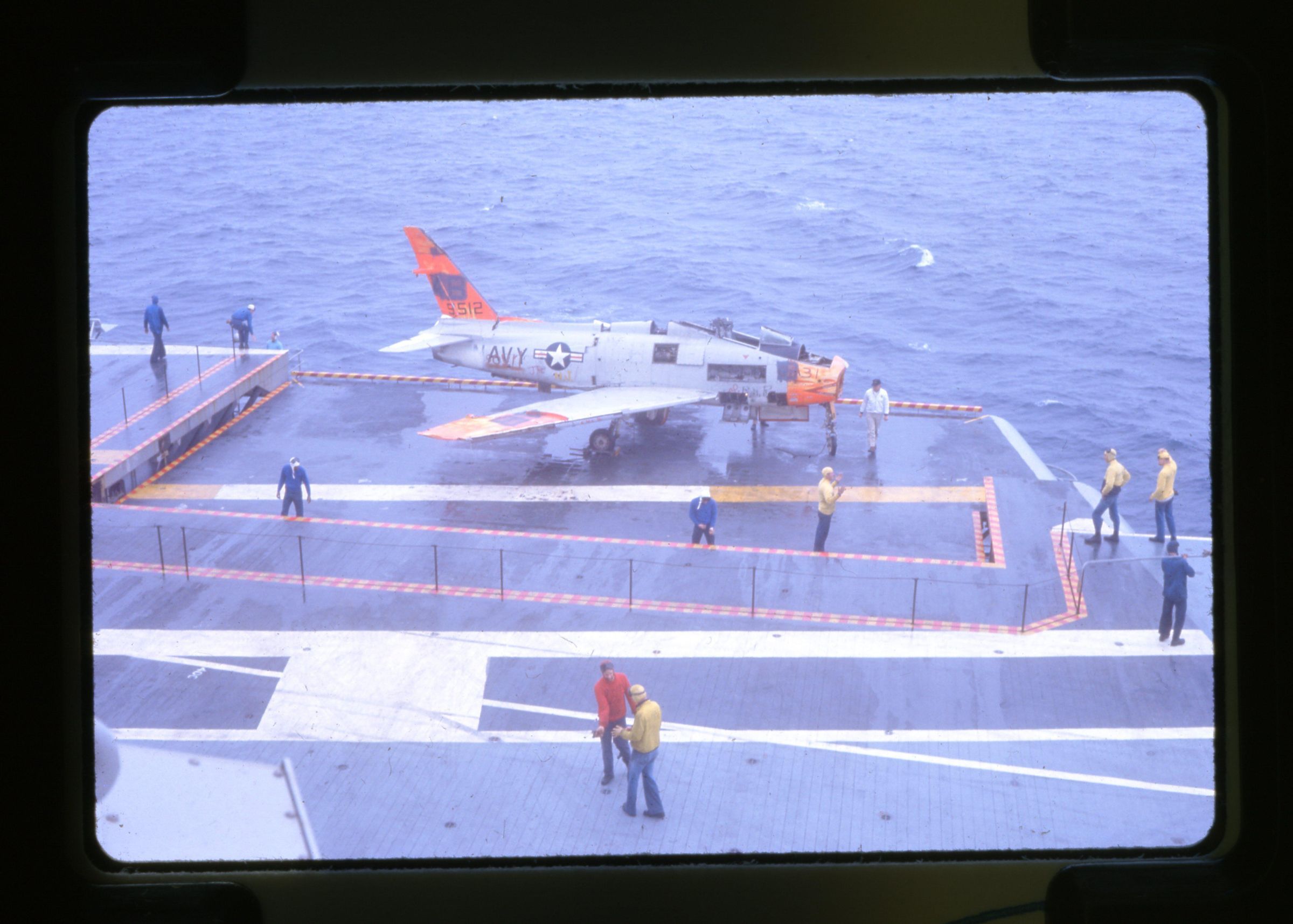 Primary Image of FJ Fury Riding on an Aircraft Elevator