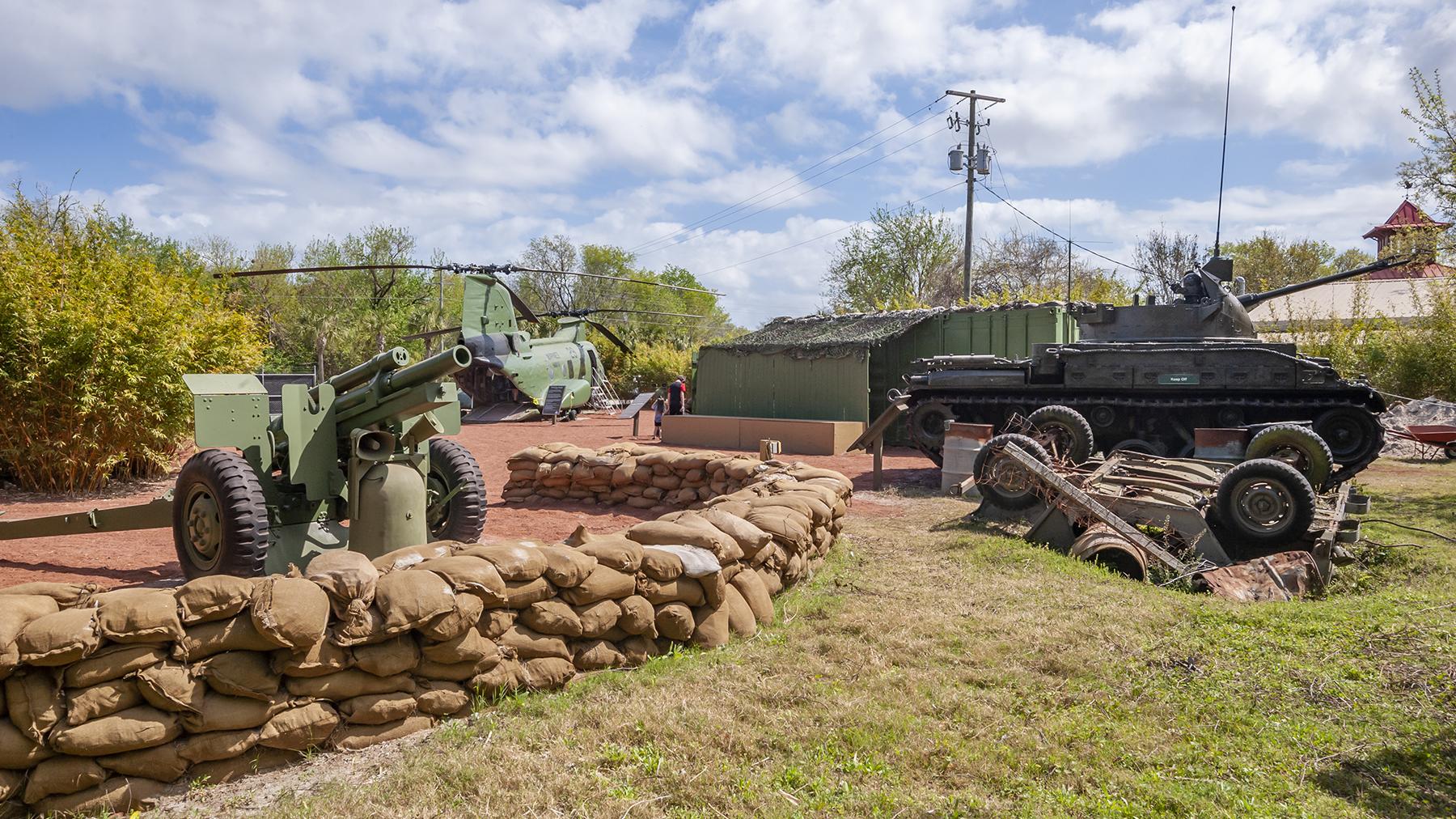 Vietnam Experience showing vehicles and guns