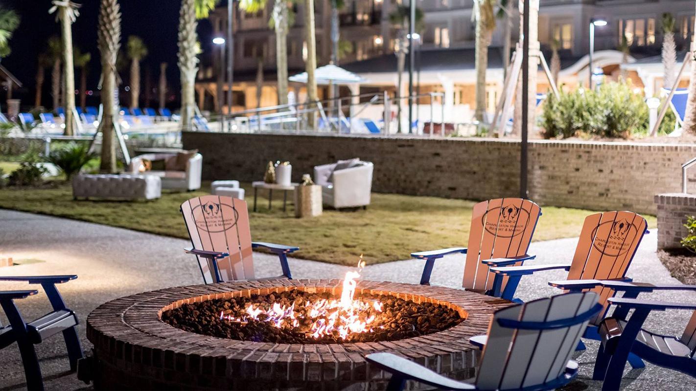 Outdoor firepit and chairs located at Charleston Resort & Marina