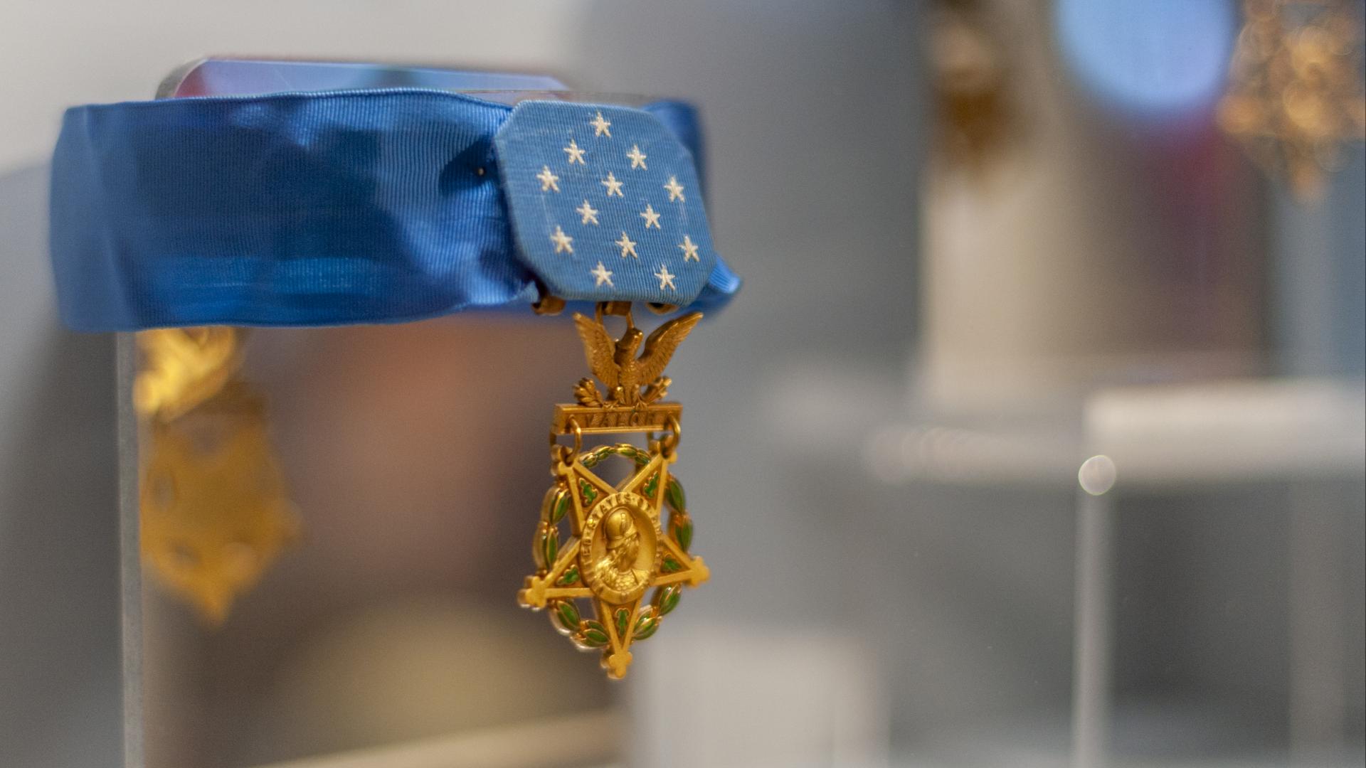 A Medal of Honor displayed in a museum.