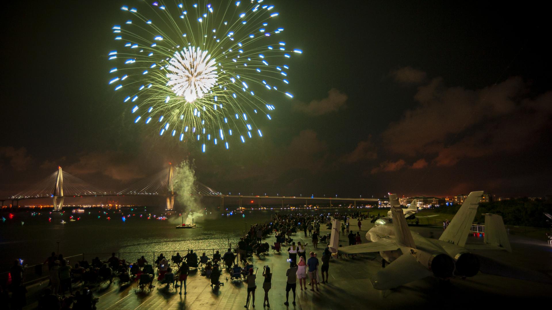 Fireworks blast near the USS Yorktown