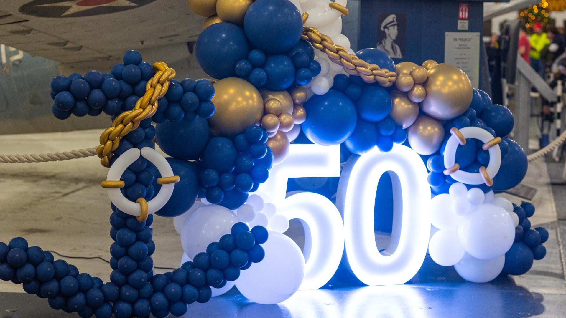 Balloons and the number 50 in marquee lights to celebrate the anniversary.