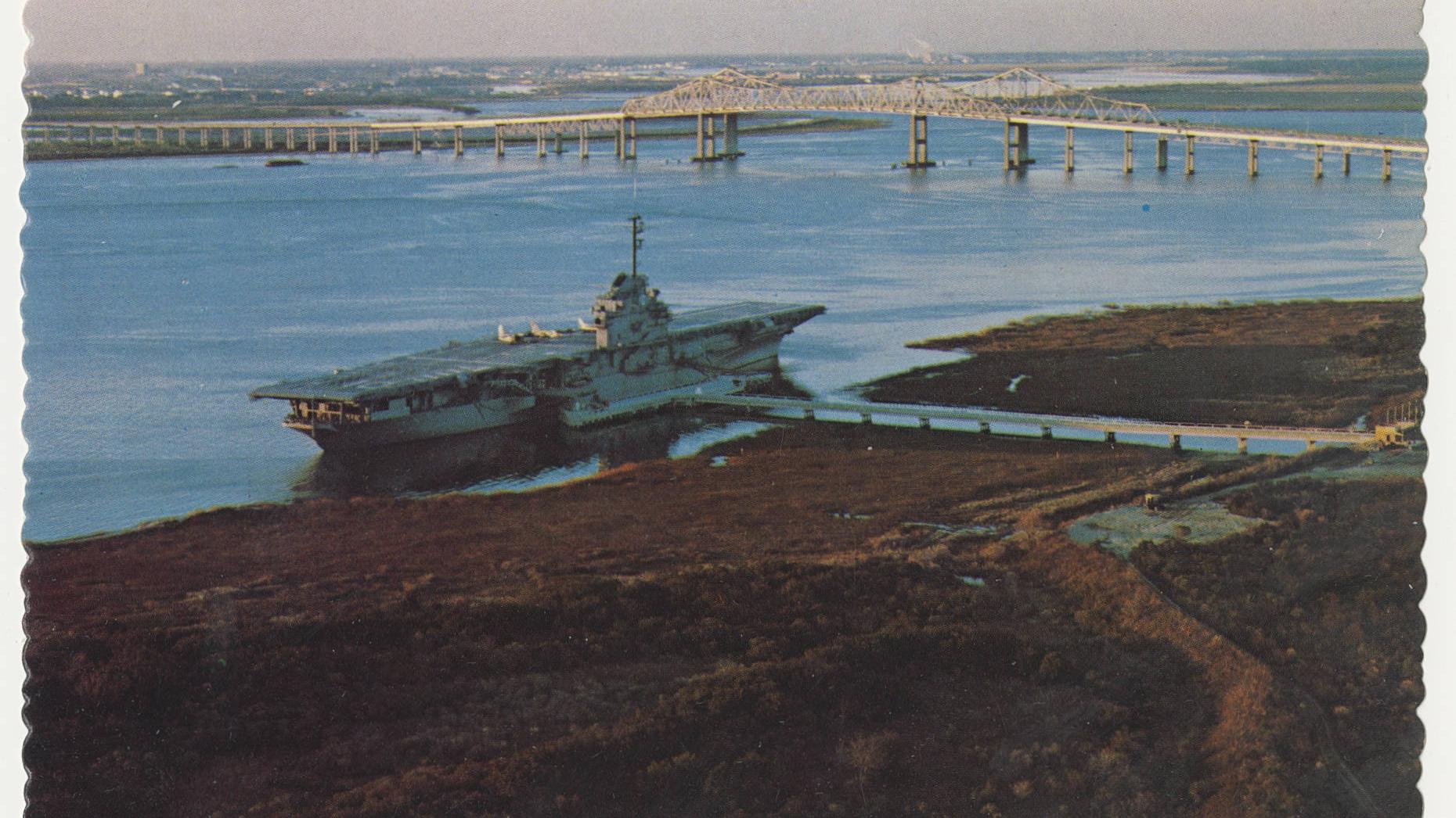 Vintage postcard image of the USS Yorktown in Charleston Harbor.
