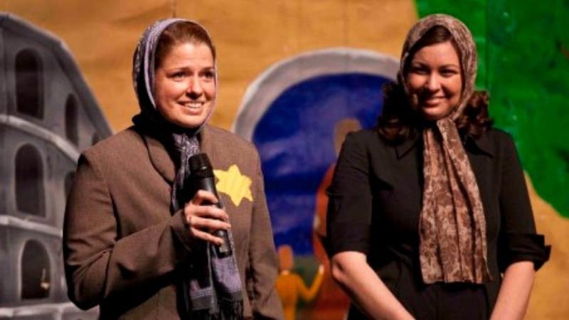 Two woman preforming in "Life in A Jar" play on Holocaust Remembrance Day