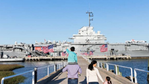 Family walking towards Patriots Point