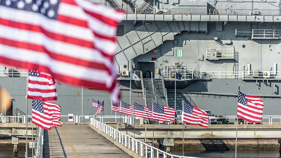 Veterans Day at USS Yorktown with American flags outside