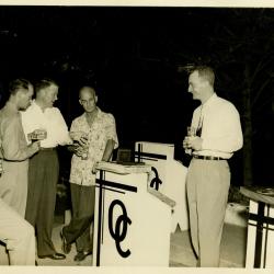 Primary Image of Captain Arnold McKechnie Receiving Gifts at his Farewell Party