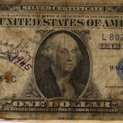 Primary Image of Burnt Dollar Found after the USS Franklin (CV-13) Disaster