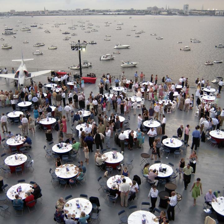 Tables set up for an event on the flight deck