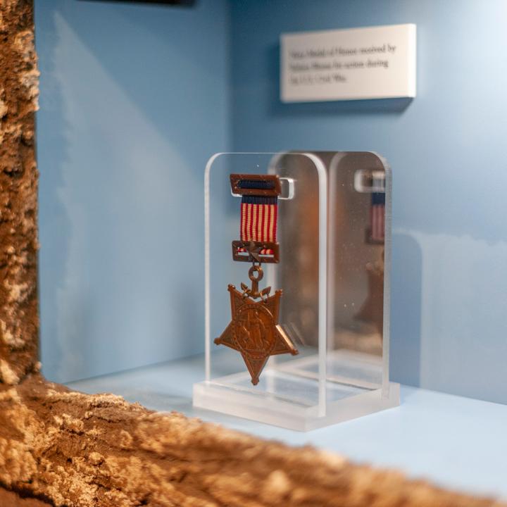 A medal on display inside the Medal of Honor Museum