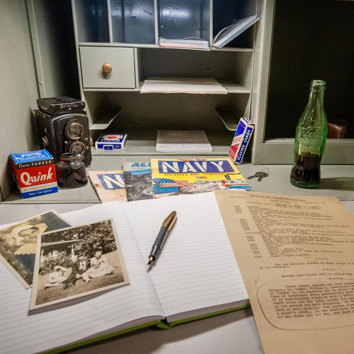 Closeup of Officer's desk with various desk items