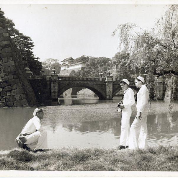 From our collections, sailors stand in the imperial garden in Tokyo. 