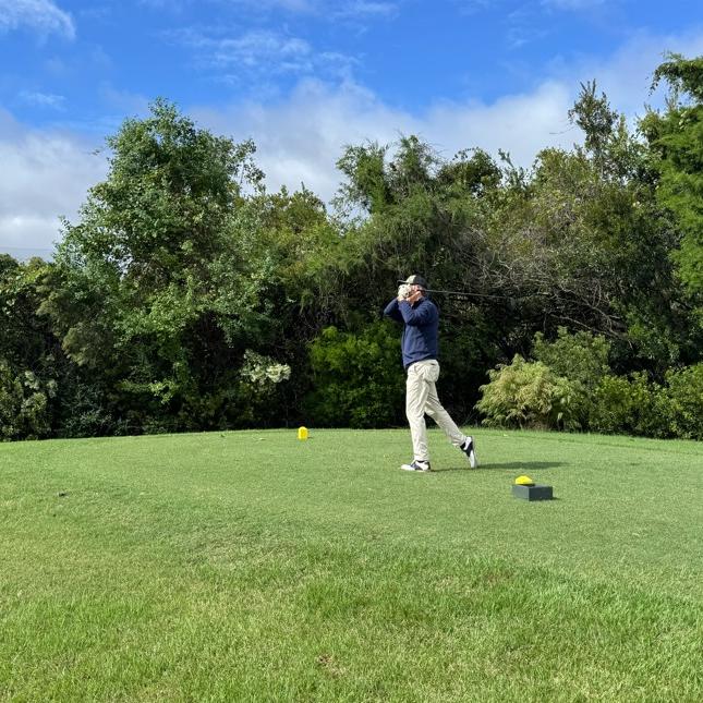 A man golfing