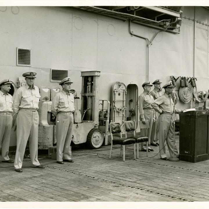 Primary Image of Captain McKechnie Addressing the Crew of the USS Yorktown (CVA-10)