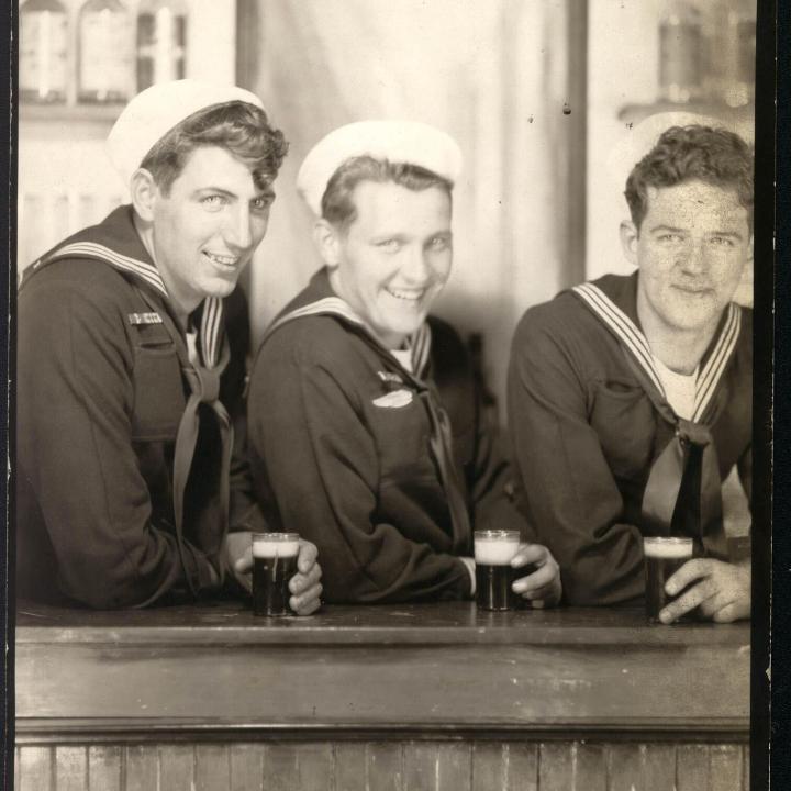 Primary Image of USS Hancock (CV-19) Sailors Enjoying a Beer