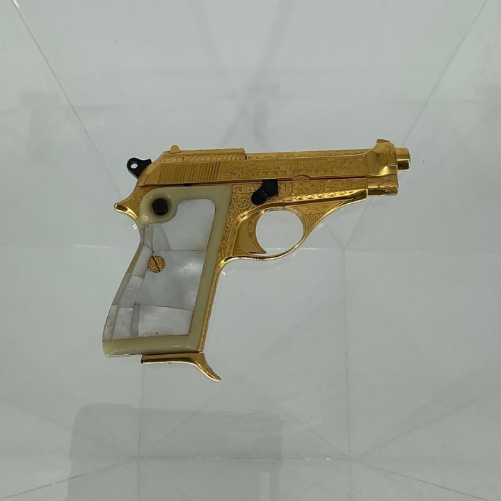 Primary Image of Gold-Plated Beretta of James Cain