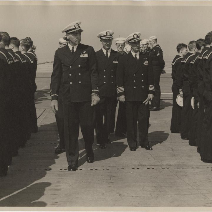 Primary Image of Captain Arnold W. McKechnie and Chief Boatswain George A. Lentz Inspect the Crew Aboard the USS Yorktown (CVA-10)