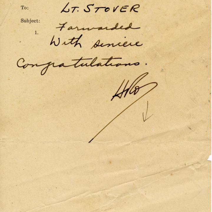 Primary Image of Elisha "Smokey" Stover Receiving a Congratulatory Memorandum Dated May 18, 1943