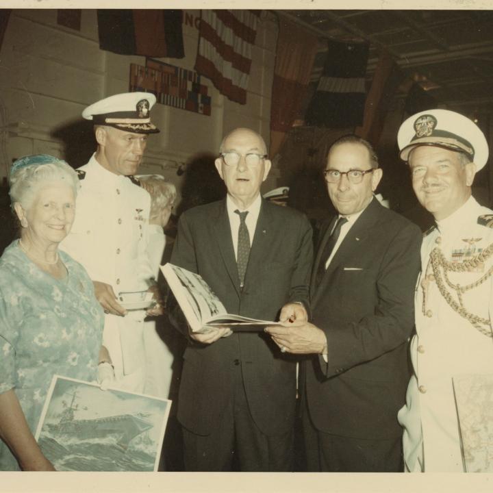 Primary Image of Arthur Beaumont Presents one of his Paintings to Captain Cain and The USS Yorktown