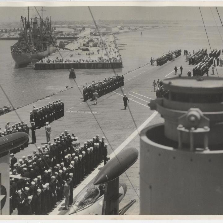 Primary Image of USS Yorktown's Crew at Flight Deck Parade as They Leave Port