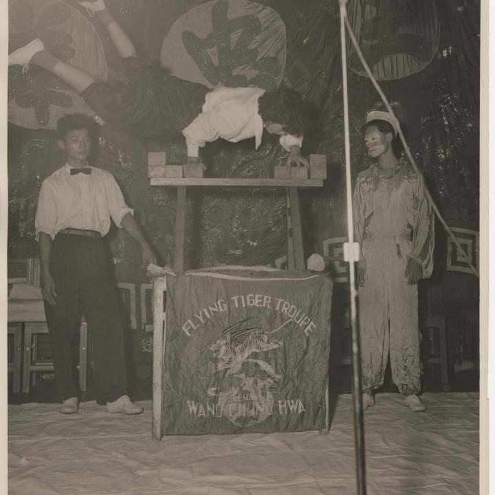 Primary Image of Flying Tiger Troupe Performs Acrobatics Aboard the USS Yorktown (CVA-10)