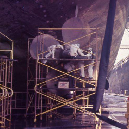 Primary Image of The USS Yorktown (CVS-10) Undergoing Propellor Repairs While in Drydock