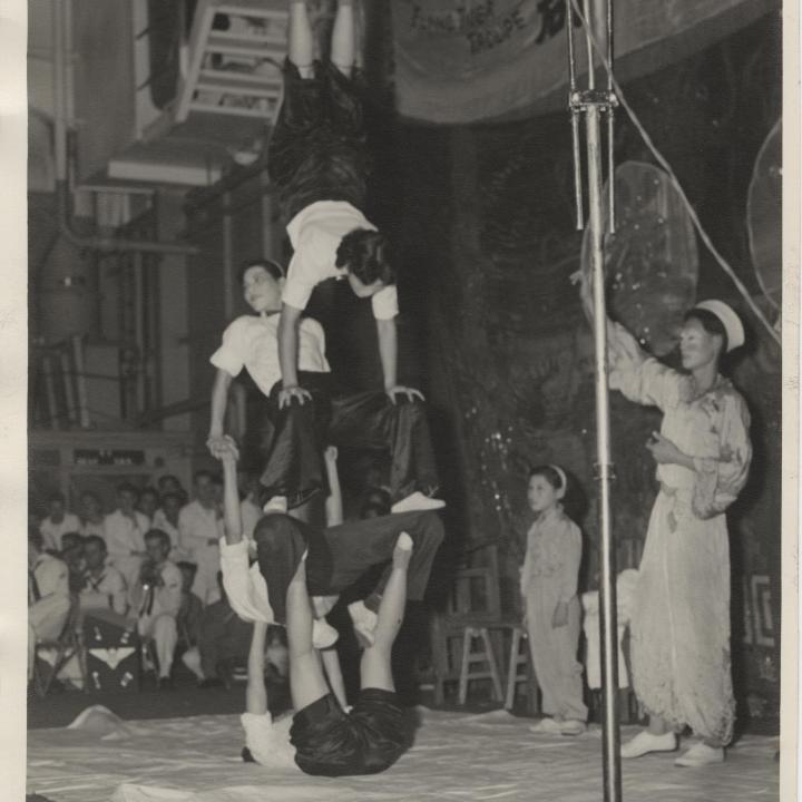 Primary Image of The Flying Tiger Troupe Balances Aboard (CVA-10)