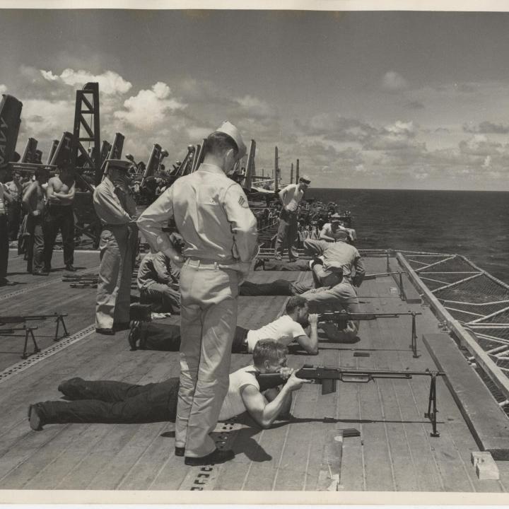 Primary Image of Marines Practice Firing their Rifles from the Flight Deck