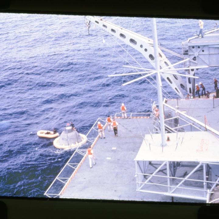Primary Image of The Apollo 8 Capsule Being Brought Aboard The USS Yorktown (CVS-10)