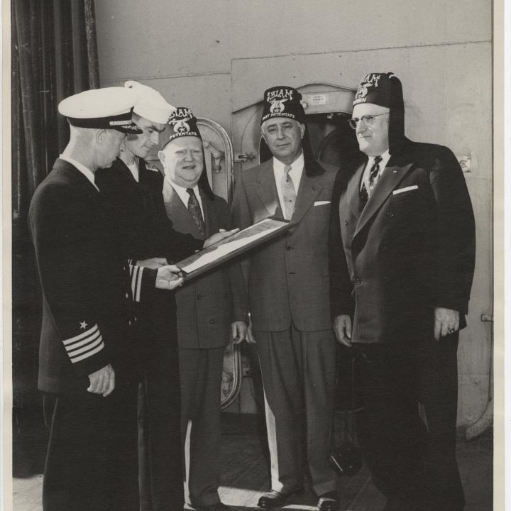 Primary Image of The Shriners Present the USS Yorktown (CVA-10) a Plaque