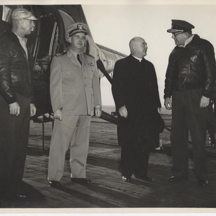Primary Image of Captain McKechnie and Cardinal Francis Spellman Standing on the Flight Deck